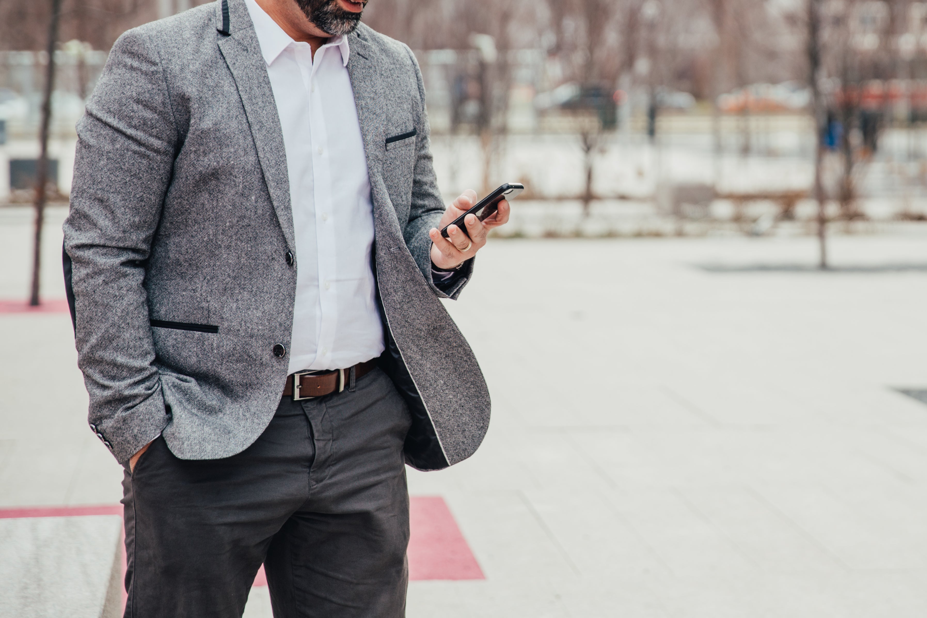 files/business-man-checks-mobile.jpg